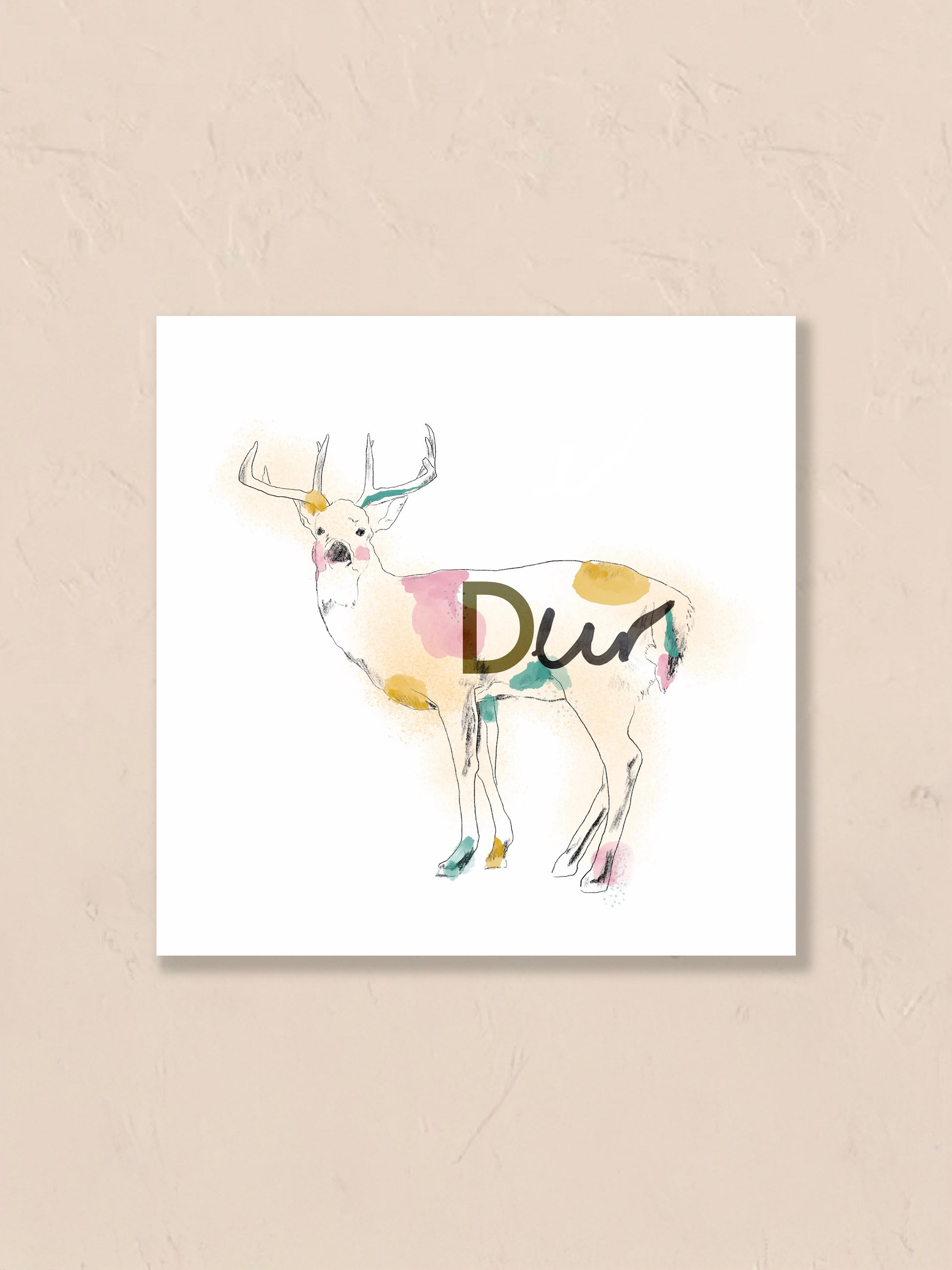 Watercolor painting of a deer with the letter 'D' floating on a beige background. Artist: Joëlle Diane