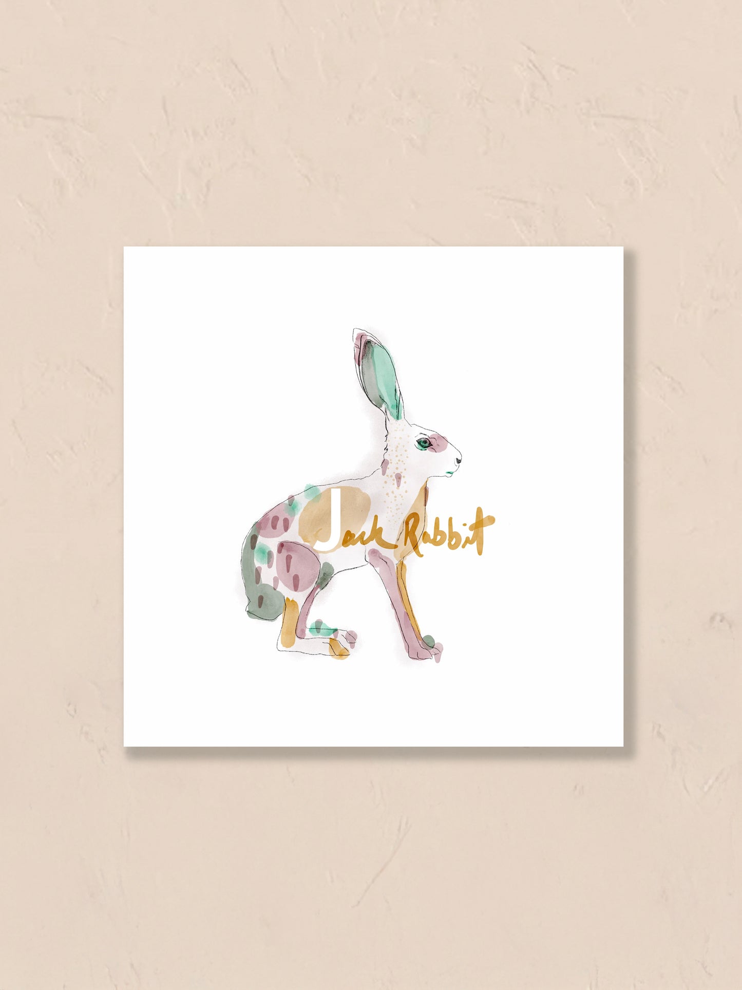 Watercolor painting of a jack rabbit with the letter 'J' floating on a beige background. Artist: Joëlle Diane